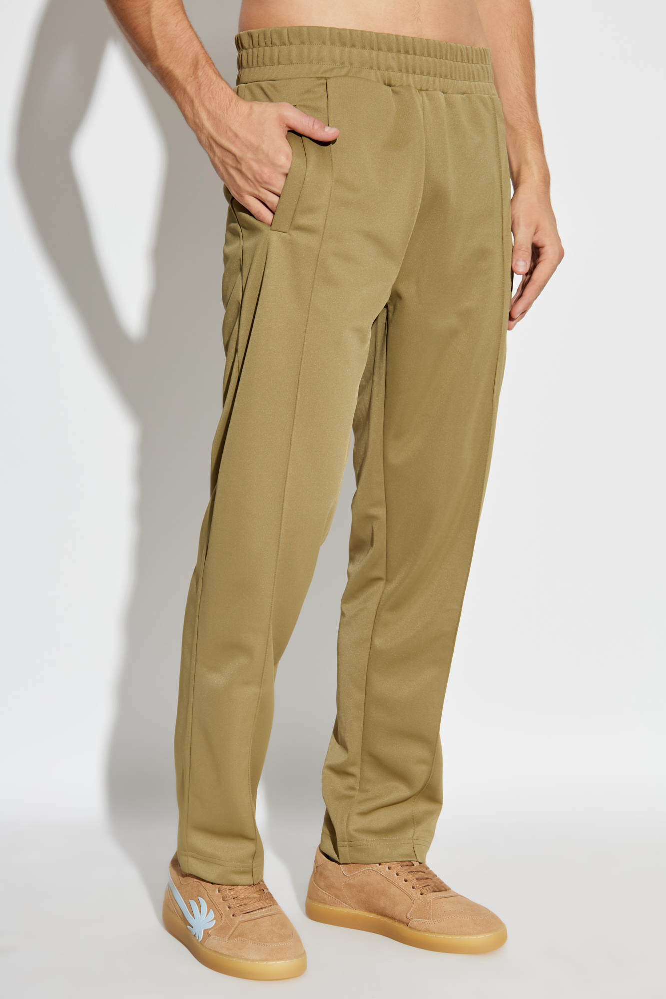 Green Trousers with stitching on the legs Palm Angels